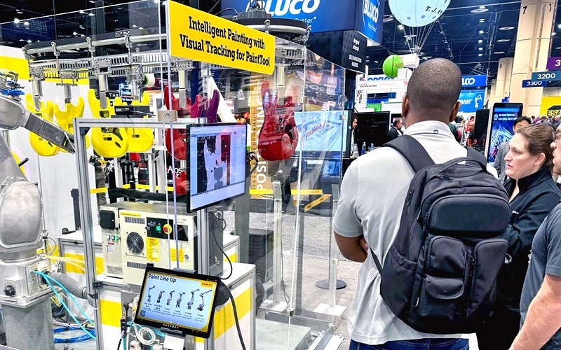 FANUC demonstrates paint programming and inspections with a customrobot setup.