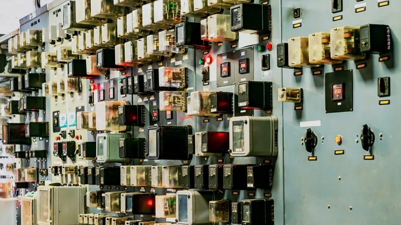  Figure 1. An electrical cabinet with many relays of different types used in power stations.