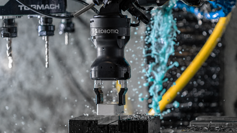 The Hand-E Adaptive Gripper’s IP67-sealed design supports machine-tending applications where coolant, dust, and debris are part of daily operation