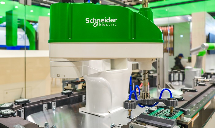 Lexium SCARA robot in an electronic assembly operation.
