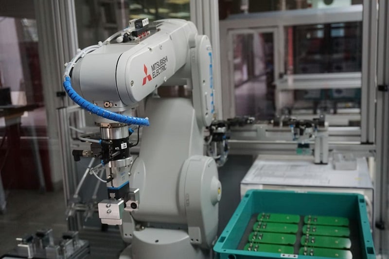 Figure 1. A robot uses synchronized motors to perform work.