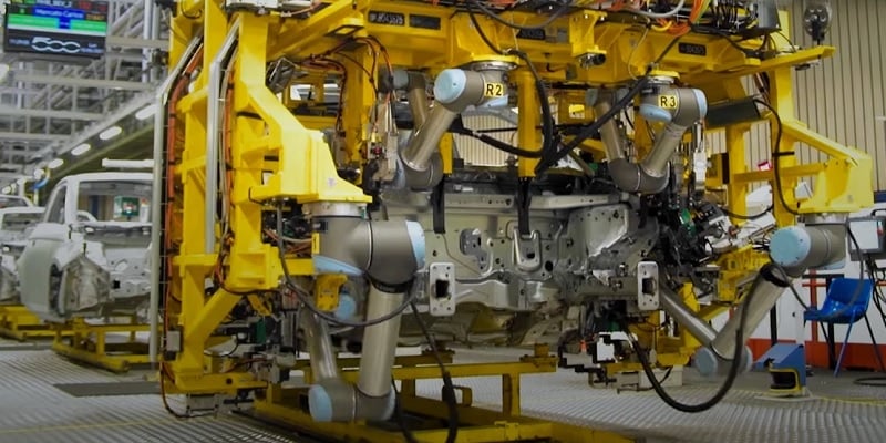 UR cobot fleet assembles vehicles on an automated line