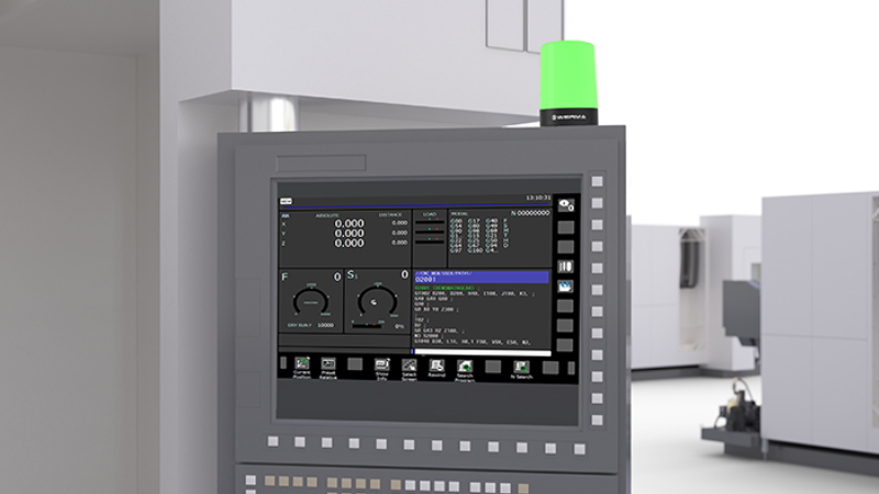 An MC55 High signal light being used to show the status of a CNC machine