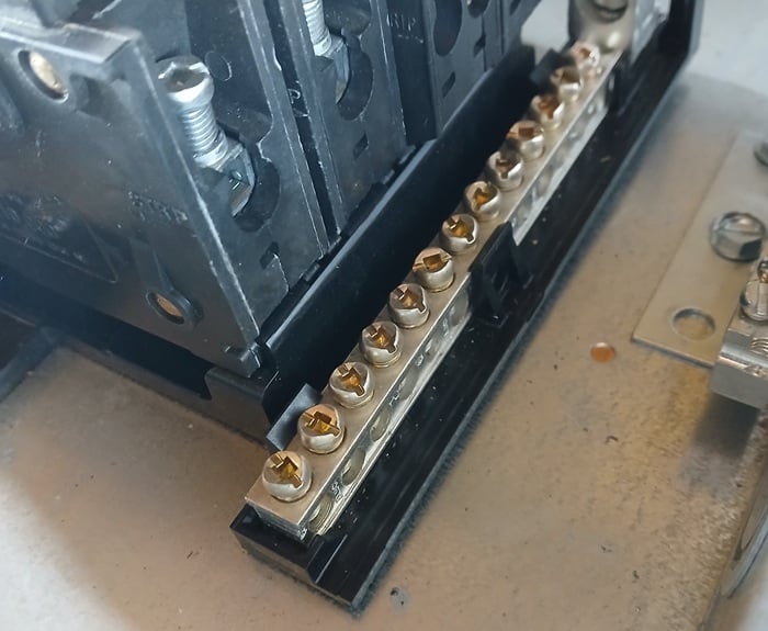Figure 9. A bus bar as seen in a new residential power sub-panel.