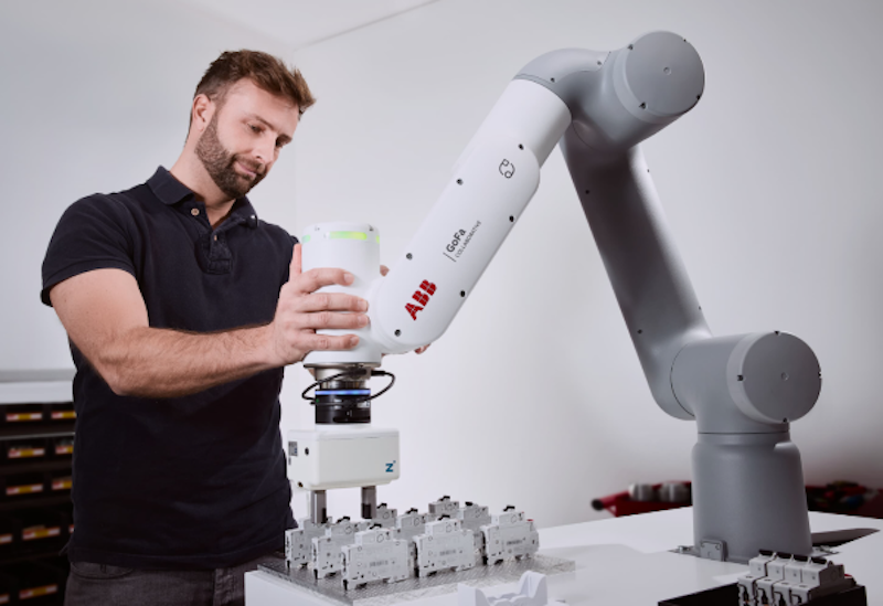 ABB demonstrates a GoFa cobot performing an electronic application by picking and placing circuit breakers.