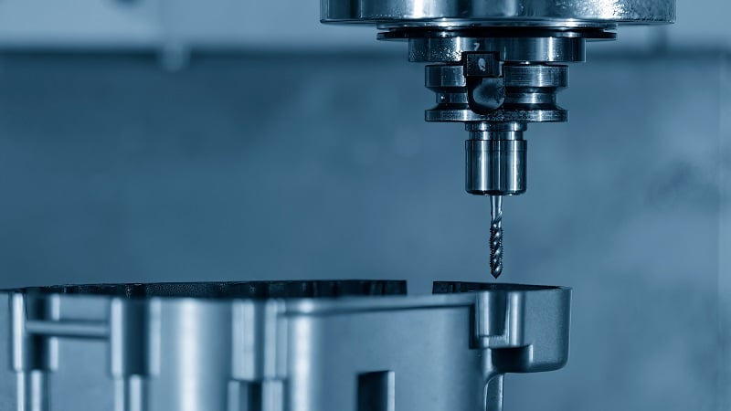  Figure 1. Thread tapping requires extreme precision and coordination between z-motion and rotation speed.