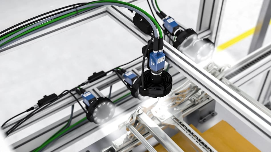 The LRL ring light depicted aiding machine vision cameras that are inspecting car seat frame mounting holes